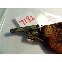 4.25" 1890's water gun, metal revolver with rubber balloon type bag, just squeeze, RARE TOY!