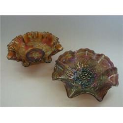 AN AMBER CARNIVAL GLASS DISH, Autumn Acorn pattern, and an amethyst bowl, Helios Grape (2)  30-40...