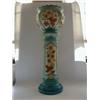 Image 1 : A BURMANTOFTS FAIENCE JARDINIERE AND STAND, late 19th Century, moulded sunflower within turquoise...