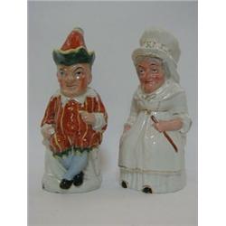 A PAIR OF NOVELTY STAFFORDSHIRE PITCHERS, late 19th Century, formed as Mr Punch and Judy, polychr...