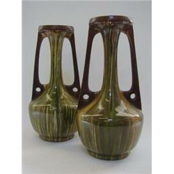 ATTRIBUTED TO LINTHORPE ART POTTERY, late 19th Century, a pair of baluster vases, extended twin h...