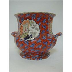 AN IRONSTONE CHINA WASTE PAIL, first half of the 19th Century, polychrome oriental panels on a co...