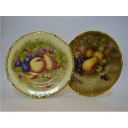 A CABINET PLATE, gadroon gilt rim, painted William pears and grapes, signed 'G.R. Budd', retailed...