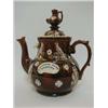 Image 1 : A MEASHAM BARGEWARE TEAPOT, late 19th Century, applied plaque 'A Present from Gresley', height 30...