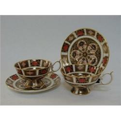 A PAIR OF ROYAL CROWN DERBY CUPS AND SAUCERS, No.1128, L (2)  30-50...