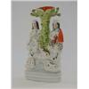 Image 1 : A STAFFORDSHIRE FLATBACK SPILL VASE, lady reading and gentleman making music seated beside a tree...