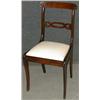 Image 1 : Un ensemble de 12 chaises de salle à manger de style Regency sur des pieds en sabre....