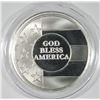 Image 1 : GOD BLESS AMERICA ON A ONE OUNCE .999 SILVER ROUND SEALED IN PLASTIC