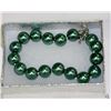 Image 1 : SEASHELL PEARL BRACELET - DARK GREEN