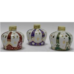 THREE SEMPE PORCELAIN LIQUOR DECANTERS