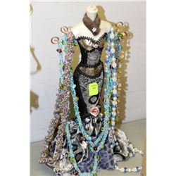 LADIES BODY DISPLAYED WITH JEWELERY:NECKLACES ETC