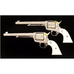 Cased Pair of Engraved Colt S.A.A.s