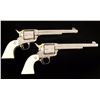 Image 2 : Cased Pair of Engraved Colt S.A.A.s