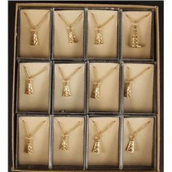 Collection of 12 Gold Plated Oilfield Necklace &