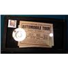 Image 1 : Small glassed display case with two latches 8” x 15” (one corner has a little tape) containing a 190