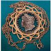 Image 1 : 1880 Cut-out Morgan Silver Dollar in fancy bezel and suspended from a gold-plated chain.