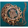 Image 2 : 1880 Cut-out Morgan Silver Dollar in fancy bezel and suspended from a gold-plated chain.