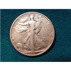 1920 S Walking Liberty Half Dollar. VG. Red Book value $19.00.