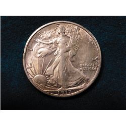 1917 P Walking Liberty Half Dollar. AU. Red Book value $70.00.