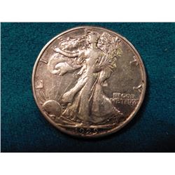 1929 S Walking Liberty Half Dollar. EF cleaned. Red Book value $115.00.