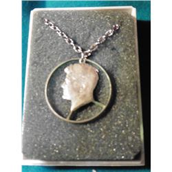 Silver Kennedy Half-Dollar Cut-out Coin on Necklace and in jewelry case. Originally priced years ago