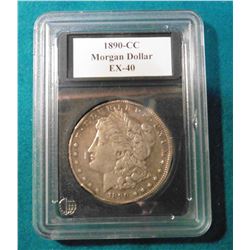 1890 CC Morgan Silver Dollar with a few rim bruises in a plastic case. Guaranteed Authentic mintage 