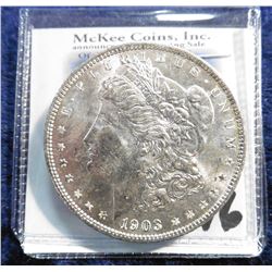 1903 O U.S. Morgan Silver Dollar. Superb Brilliant Uncirculated. Lovely golden toning. Super Key dat