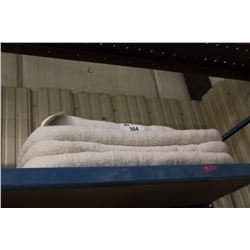 STACK OF ASSORTED WHITE RELAX DOG BEDS