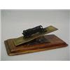Image 1 : Bronze and wood desk paper clip, figure of charging bull on hinged clip, mounted on wooden base,...