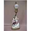 Image 1 : Meissen double figural lamp, man holding bottle, and woman with basket and grapes, on oval brass...