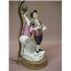 Image 3 : Meissen double figural lamp, man holding bottle, and woman with basket and grapes, on oval brass...