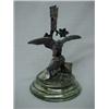 Image 1 : Victorian electroplated stand depicting eagle with outspread wings on rocks, below leaf decorated...