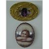 Image 1 : Two Victorian brooches, 2" high porcelo oval porcelain with transfer of Raphael type angel with t...
