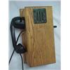Image 1 : Oak cased Magneto wall telephone, cradle on side for receiver, #145W, early 20th C., 14 1/2" high...