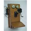Image 1 : Oak cased Northern Electric Co. wall mounted telephone, cradle on side for earpiece, shelf under...