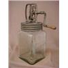 Image 3 : A square pressed glass churn and a wall mount grinder, glass churn with tin screw top with expose...