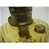 Image 2 : Amber Aladdin glass oil lamp, Model B, six sided base, 13" high Estimate 100/200...