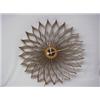 Image 1 : George Nelson for Howard Miller circular wooden electric wall clock, with undulating flaring wood...