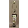 Image 1 : Bronze and enameled porcelain lamp, bronze mask mountings on each side of hand painted figural ca...