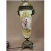 Image 2 : Bronze and enameled porcelain lamp, bronze mask mountings on each side of hand painted figural ca...