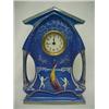 Image 1 : Art Deco porcelain cased mantle clock, gilt decoration over blue ground, scene on bottom depictin...