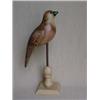 Image 1 : Carved bird on wooden stand, nicely carved tail, wood eyes, 11 1/2" high X 9" long Estimate 15...