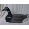 Image 1 : Early 20th C. brant decoy, 18 1/2" long X 10" high Estimate 200/400...