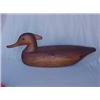 Image 1 : Hollow carved wood duck, unpainted with plastic eyes, 16 1/2" long X 6" high Estimate 50/100...