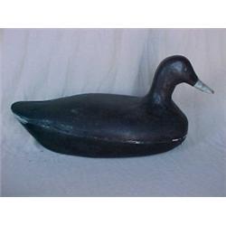 Duck decoy, solid black duck with wood eyes, weighted, nicely carved, 7 in circle on the bottom,...