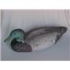 Image 1 : Duck decoy, cork with wood tail and head, one eye missing 20" long X 7" high Estimate 50/150...