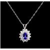 Image 1 : 0.76ct Tanzanite and Diamond Pendant With Chain - 18KT White Gold
