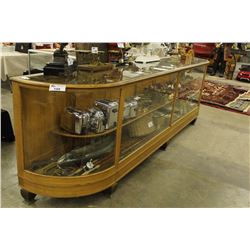 1930S OAK 11.5' CURVED GLASS STORE DISPLAY CASE