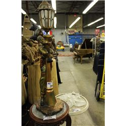 ENGLISH HAND PAINTED FIGURAL PLASTER AND ART GLASS FINIAL SHADE LAMP, 1930S