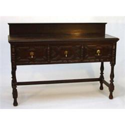 Jacobean style oak sideboard, fitted three panelled doors on turned supports…